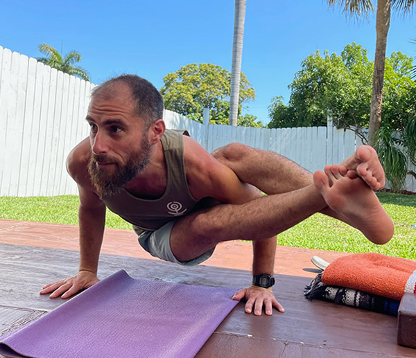 a man performing a yoga move